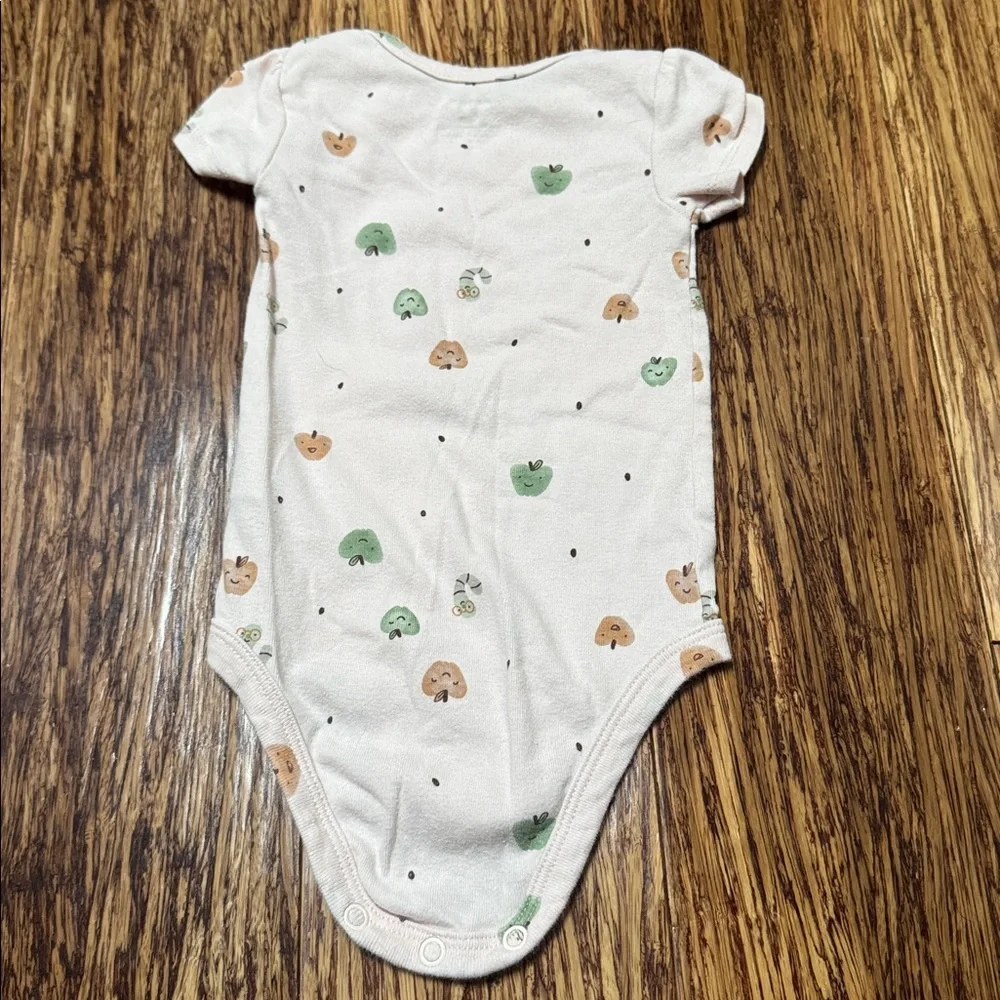 Carter’s blush pink apple worm print baby girl bodysuit size 6M